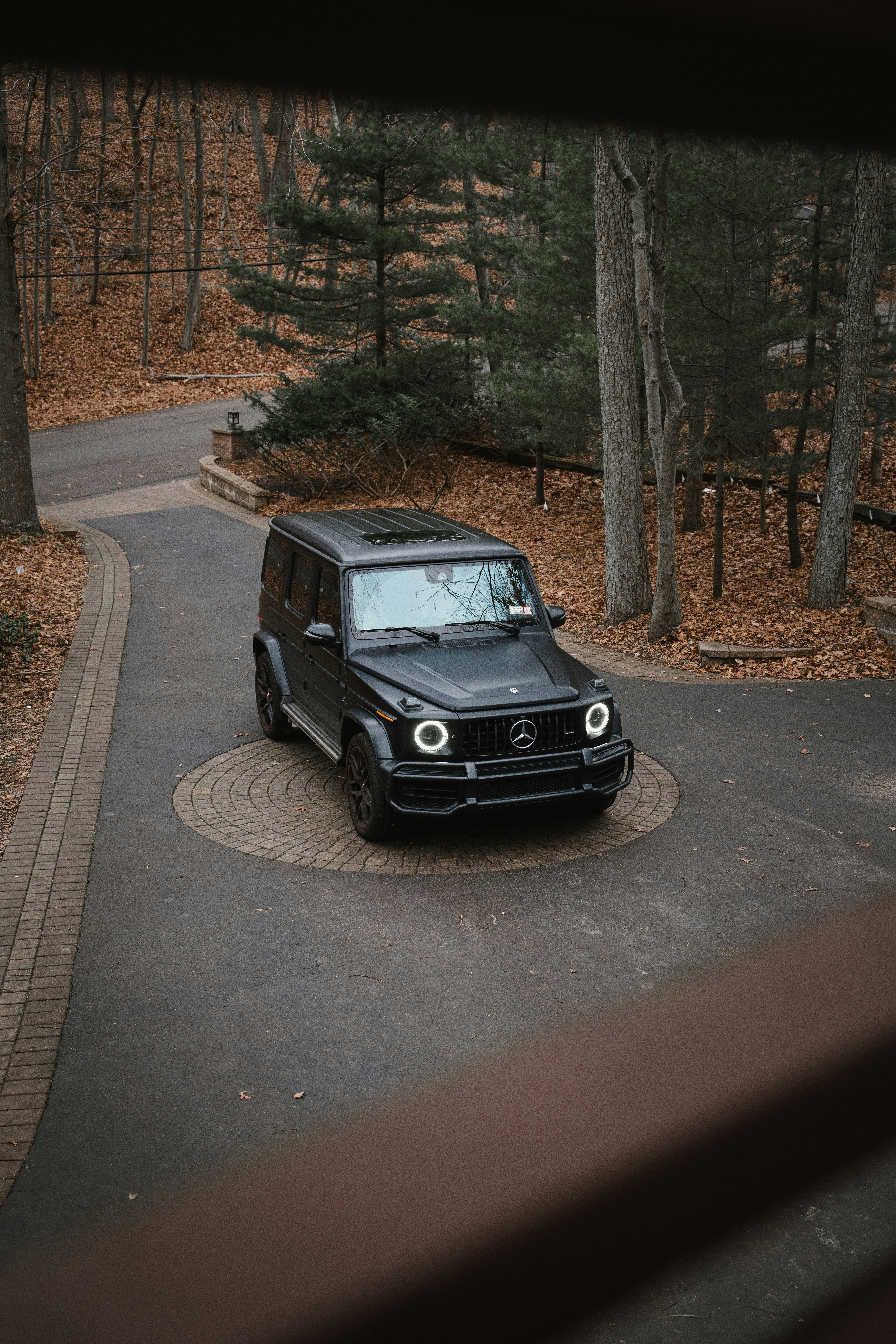 black g wagon wedding car at forest wedding venue