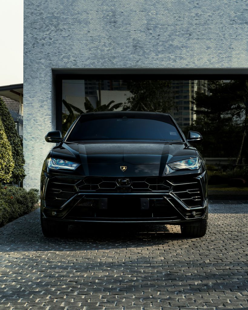 Lamborghini Urus parked in a drive