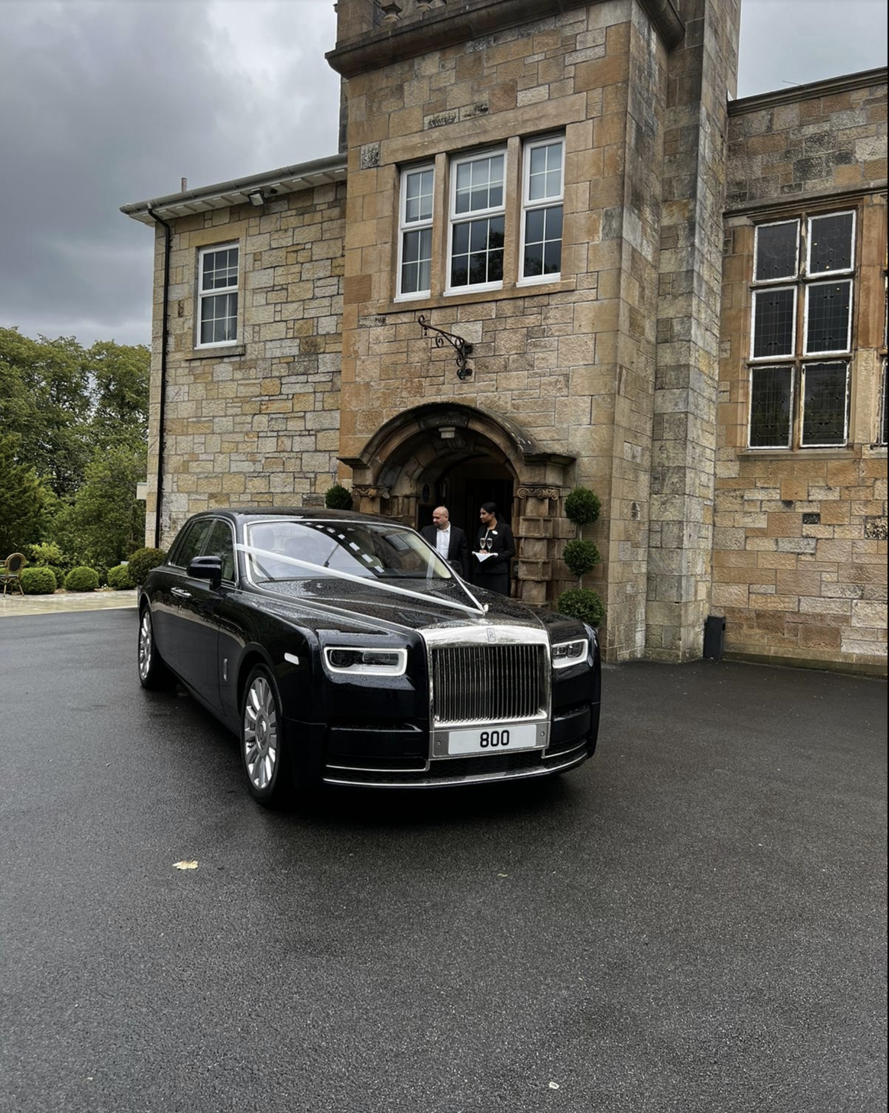 Rolls-Royce Phantom wedding car outside wedding venue