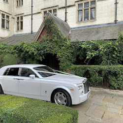 White Rolls-Royce Phantom outside hotel
